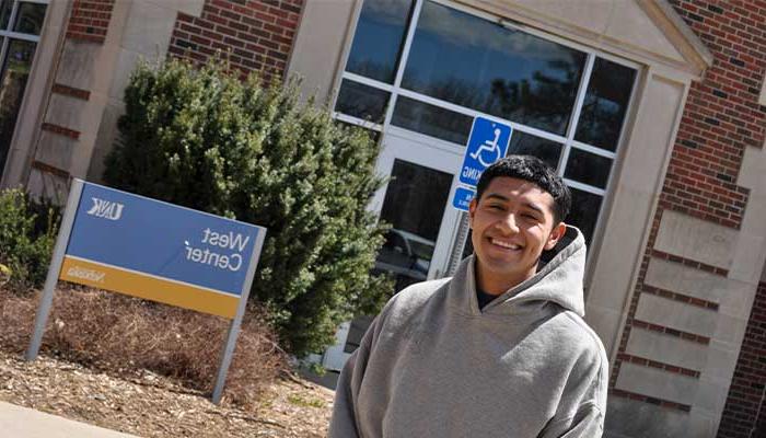 Omar in front of the West Center